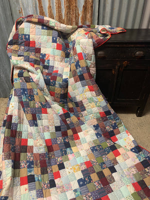 A hand sewn patchwork quilt - large double bed