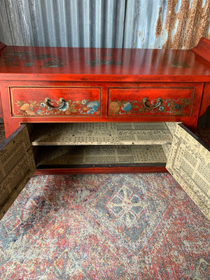 A red Chinese altar cabinet