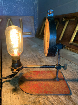 An industrial parabolic reflector lamp