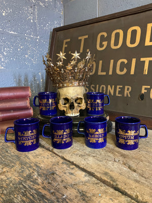 A full set of six cobalt blue apothecary mugs