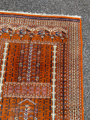 An orange ground niche or prayer rug- 175 x 98cm