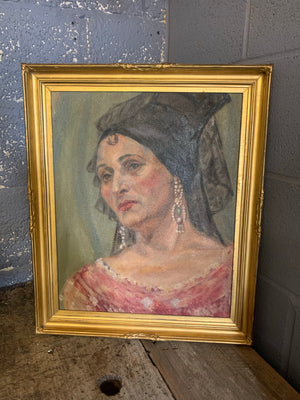 A large Spanish oil on canvas portrait of a lady in flamenco headdress