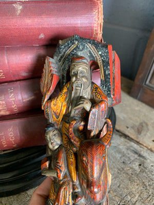 A 19th Century Chinese carving with polychrome detailing
