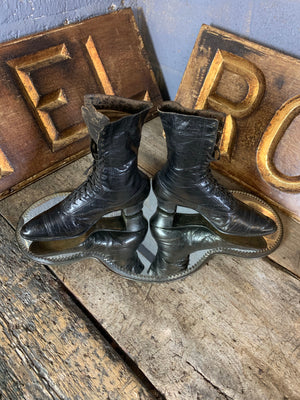 A pair of lace-up Victorian or Edwardian leather boots