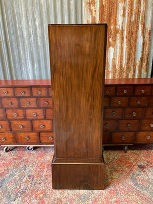 A museum style mahogany display stand