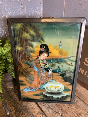 A very large reverse painted glass Geisha picture