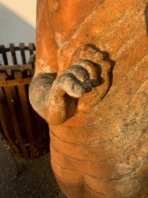 A large cast stone Buddha statue