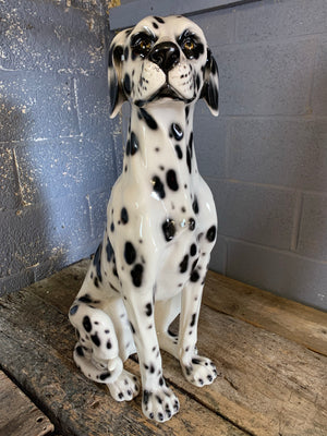 A large ceramic Dalmatian dog statue
