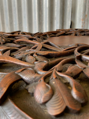 A profusely carved Anglo-Indian table by Jubbar Khan & Son