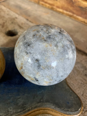 A set of four Grand Tour marble spheres