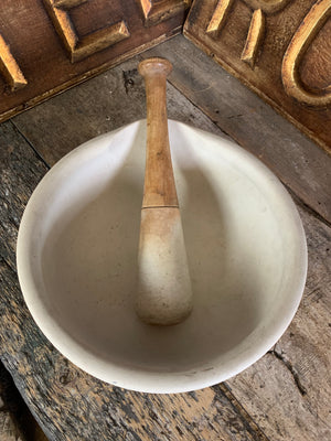 A very large ceramic mortar with matching pestle