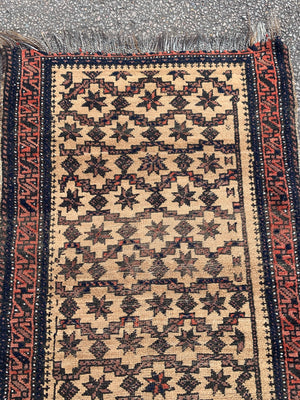 A blue brown ground Persian rectangular rug 150cm x 76cm