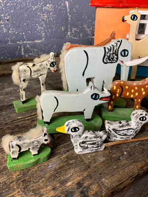 A handmade folk art Noah's Ark and animals