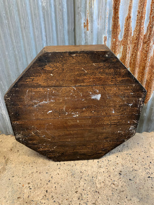 A large wooden octagonal display plinth for a statue or as a shop fitting