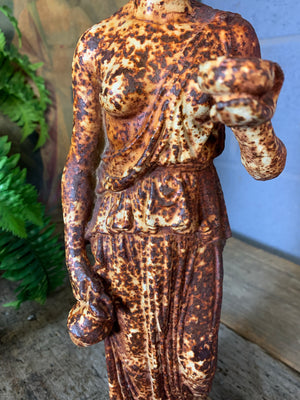 A cast iron statue of Hebe