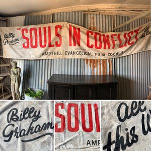 A very large advertising banner for the Billy Graham film 'Souls in Conflict' (1953)