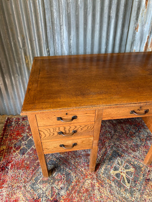 A teacher's style wooden desk