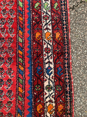 A red ground Sharashan rug - 205cm x 138cm