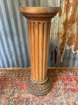 A carved wooden column