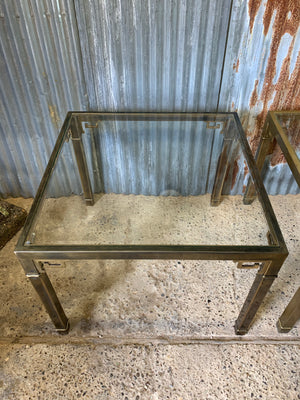 A Hollywood Regency Mastercraft square glass-topped dining table