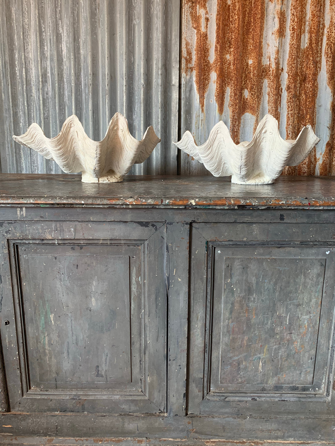 A white plaster Giant Clam Shell sculpture (Tridacna Gigas)