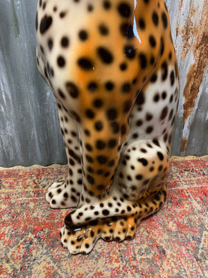 A large ceramic seated leopard statue ~ 92cm
