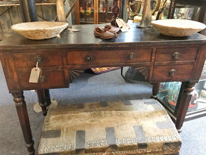 A 19th Century Georgian console table with brass castors